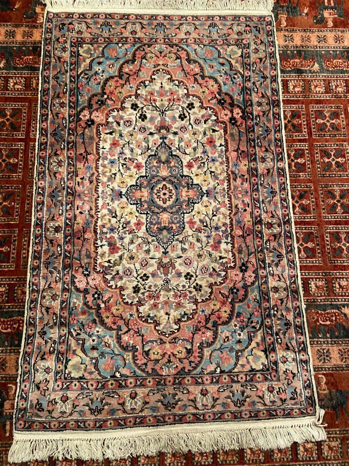 Hand-knotted oriental wool rugs