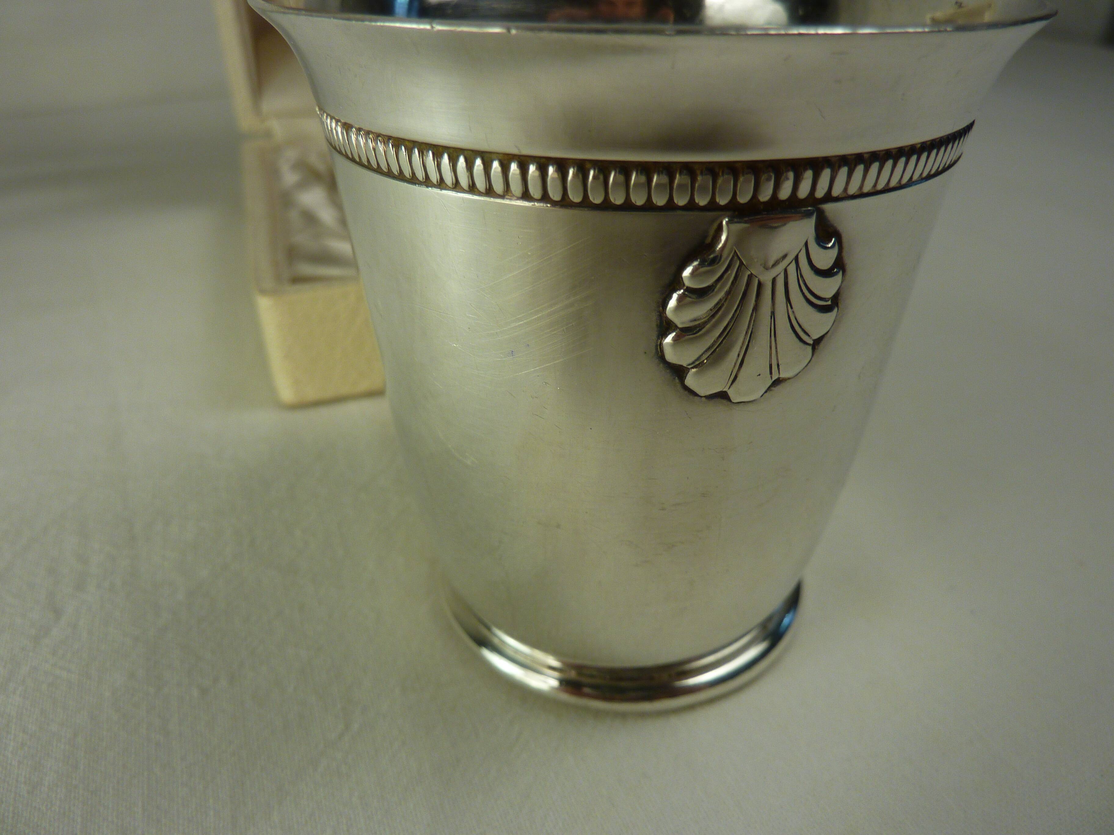 Silver metal timpani in its original case