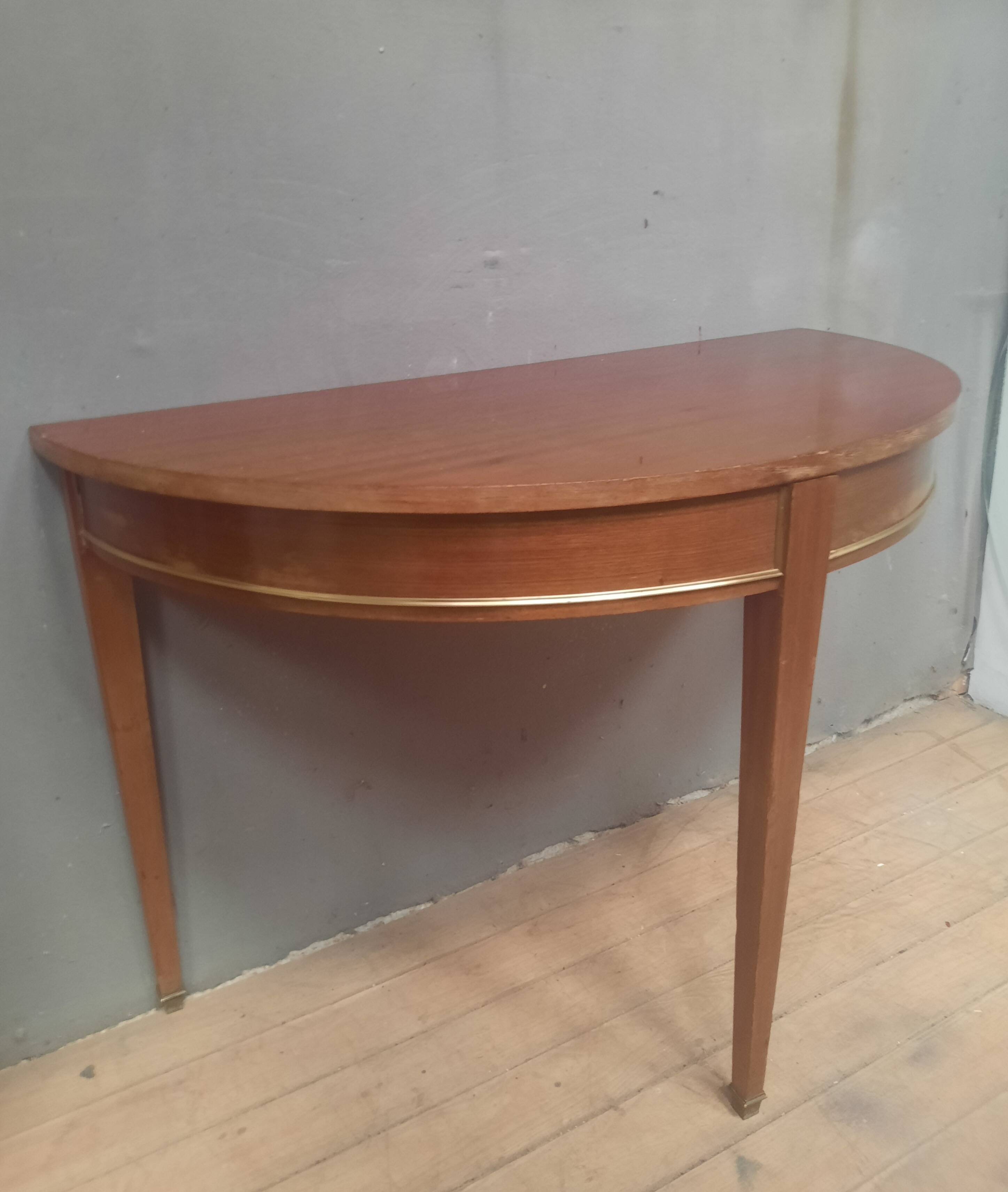 Louis XVI style console in mahogany.