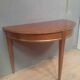 Louis XVI style console in mahogany.