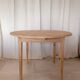 Table ronde pied fuseaux