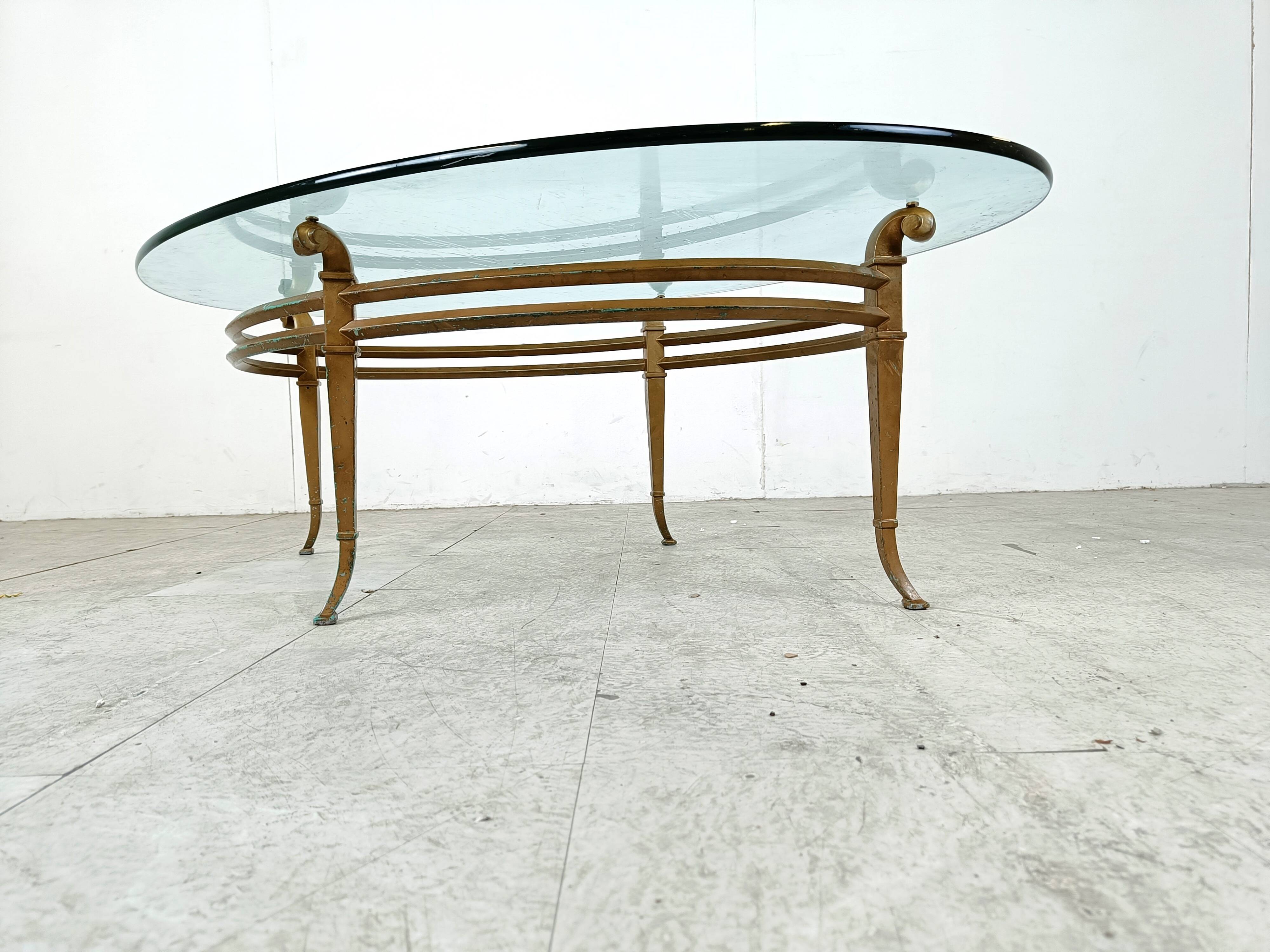 Vintage golden metal and oval glass coffee table, 1970s