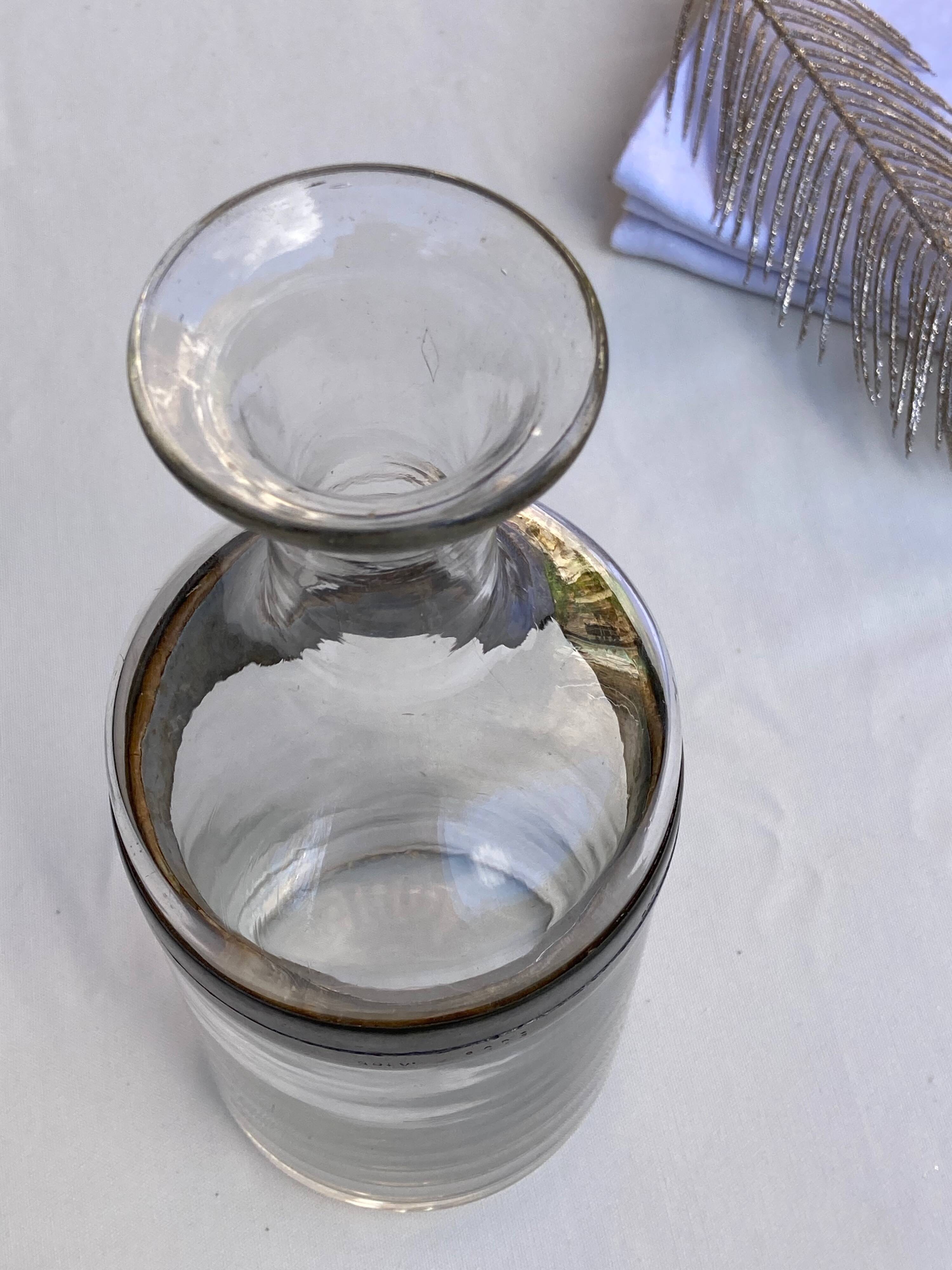 Glass and pewter screw carafe, early 20th century