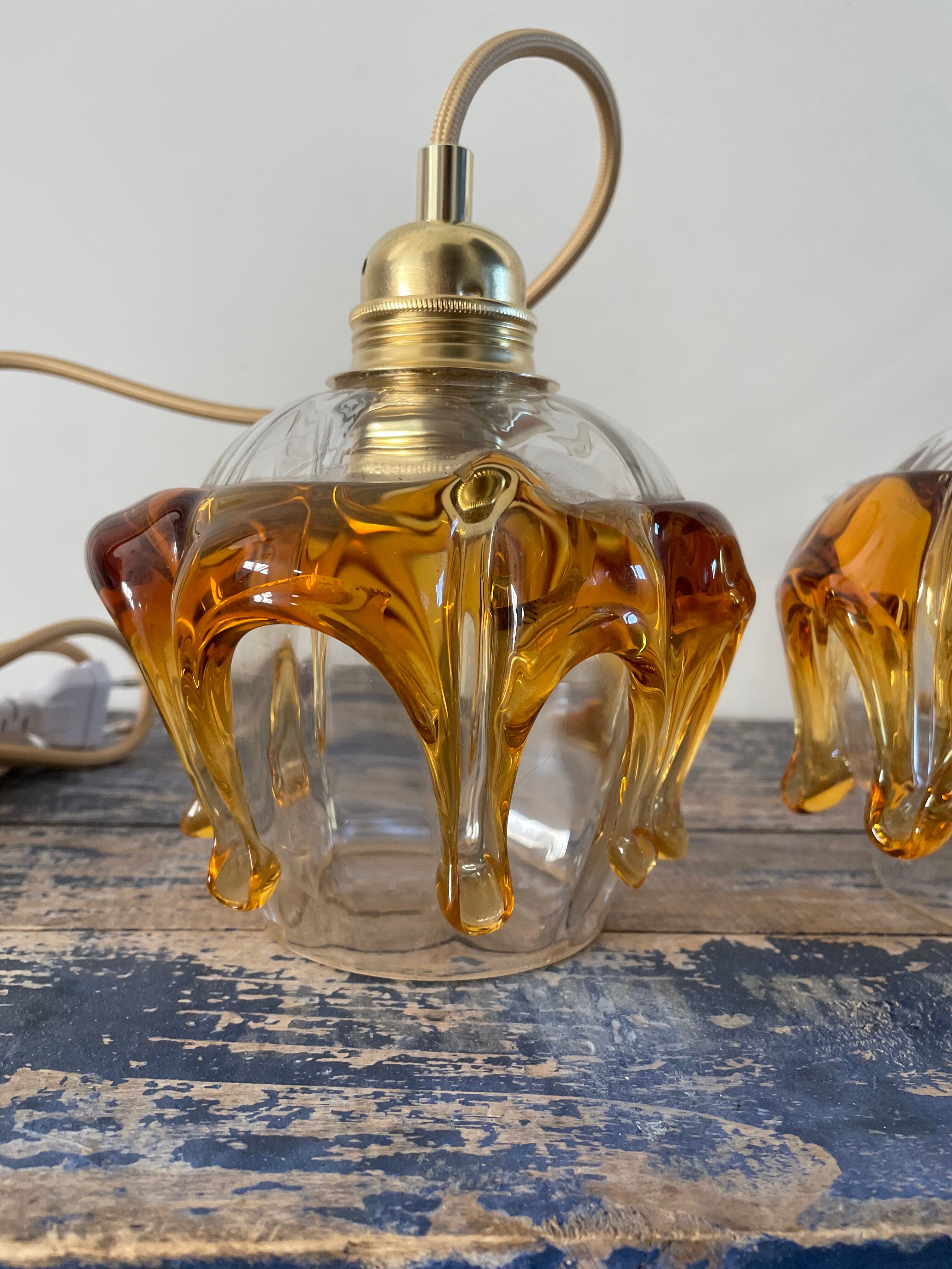 Set of two Austrian glass handhelds