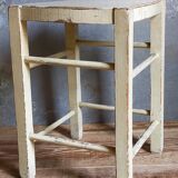 Old patinated painted wooden stool