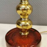Table lamp from Danish Vitrika in brass, amber colored hard pressed glass, with a shade holder.