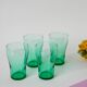 Set of 4 green glass glasses 1970
