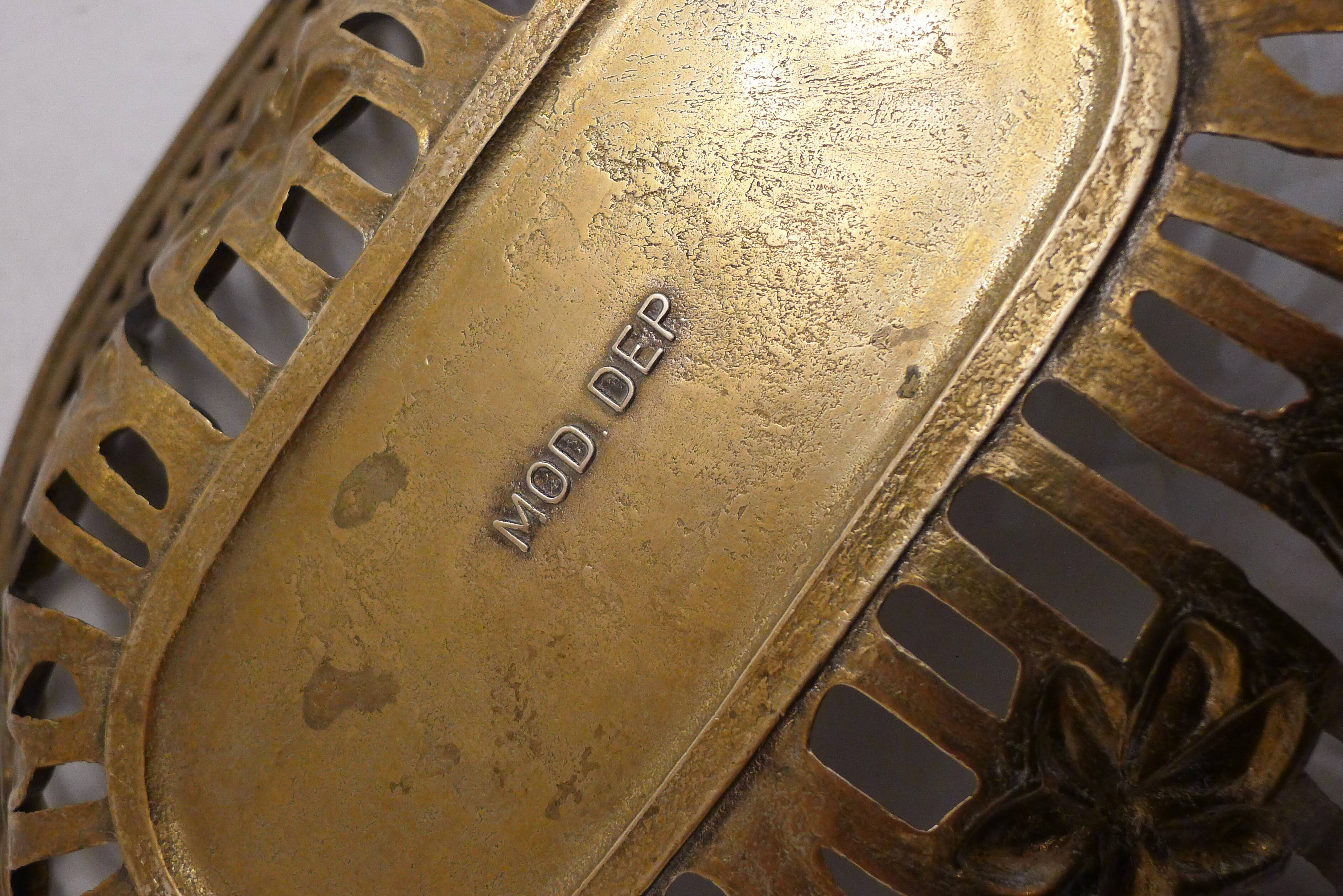 Openwork Art Nouveau basket in gilded brass