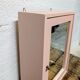 Small pink bathroom cabinet