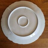 Large vintage earthenware dish with a fruit pattern.
