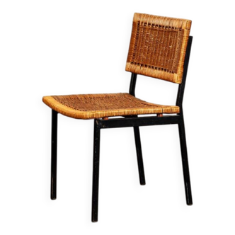 Rattan chair with black metal