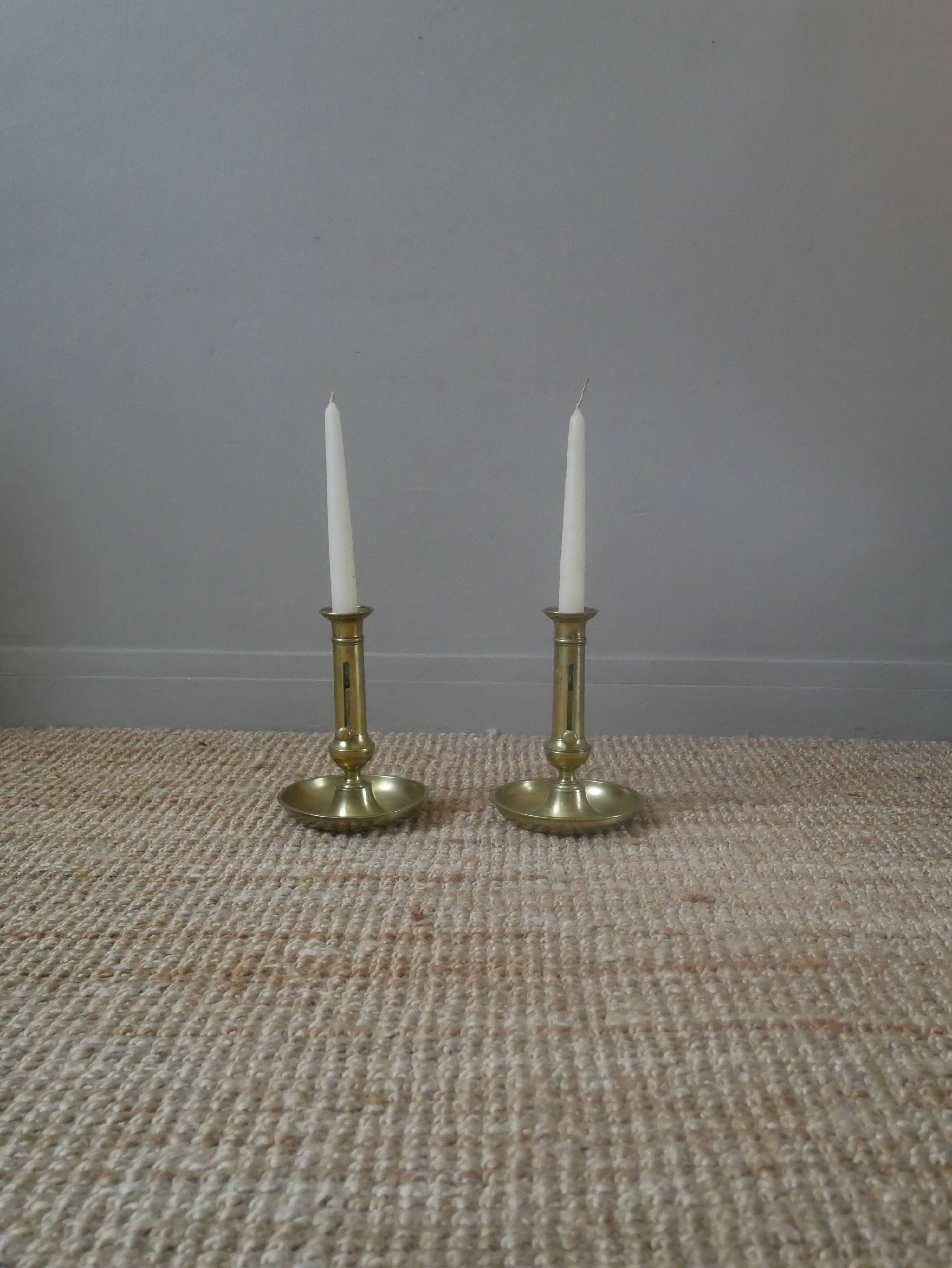 Pair of brass push-button candlestick holders in gold metal, bohemian country decoration