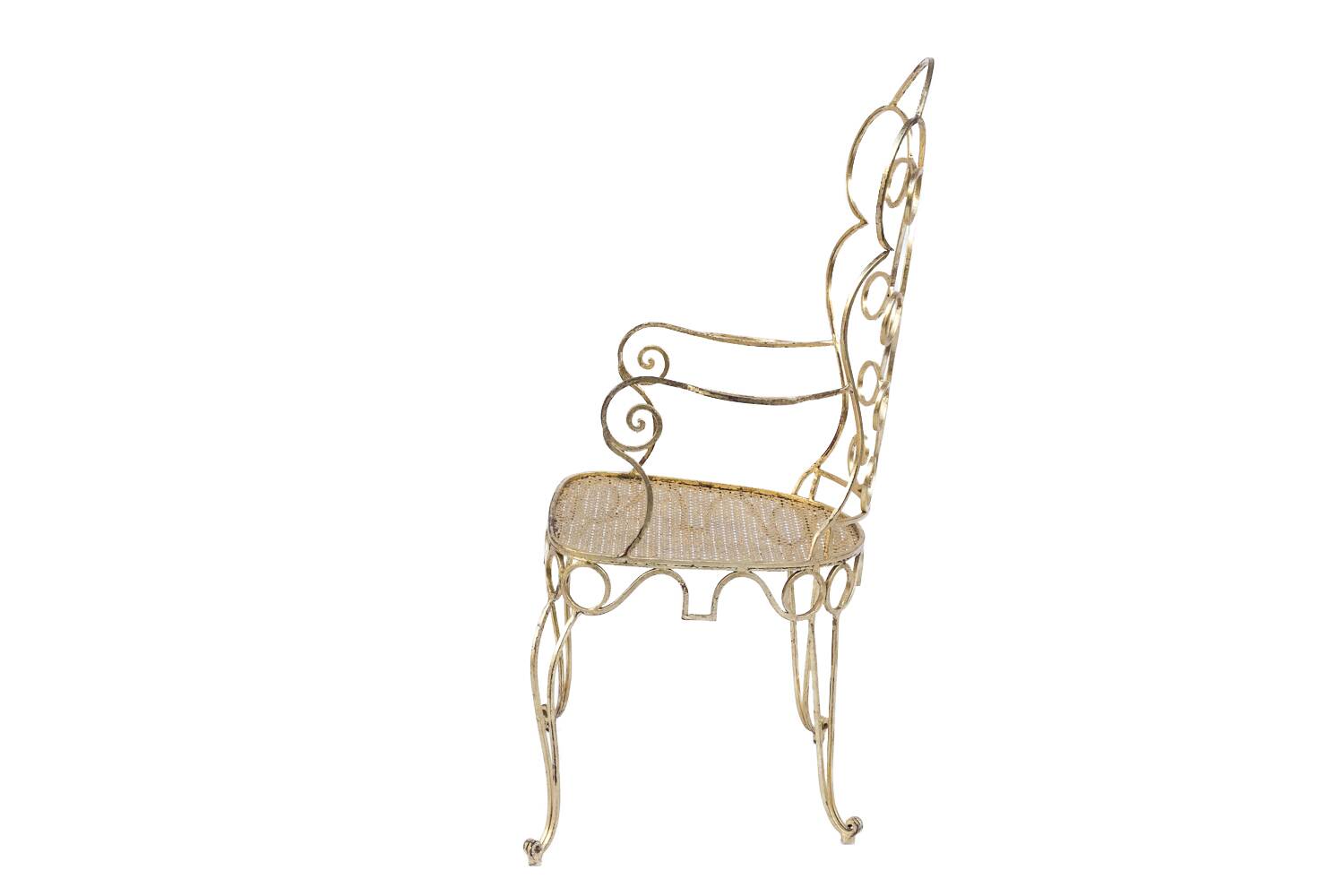 Pair of wrought iron and gilded armchairs, circa 1990