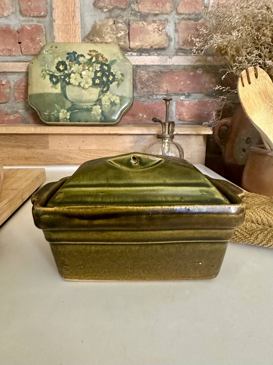 Vintage green majolica butter dish