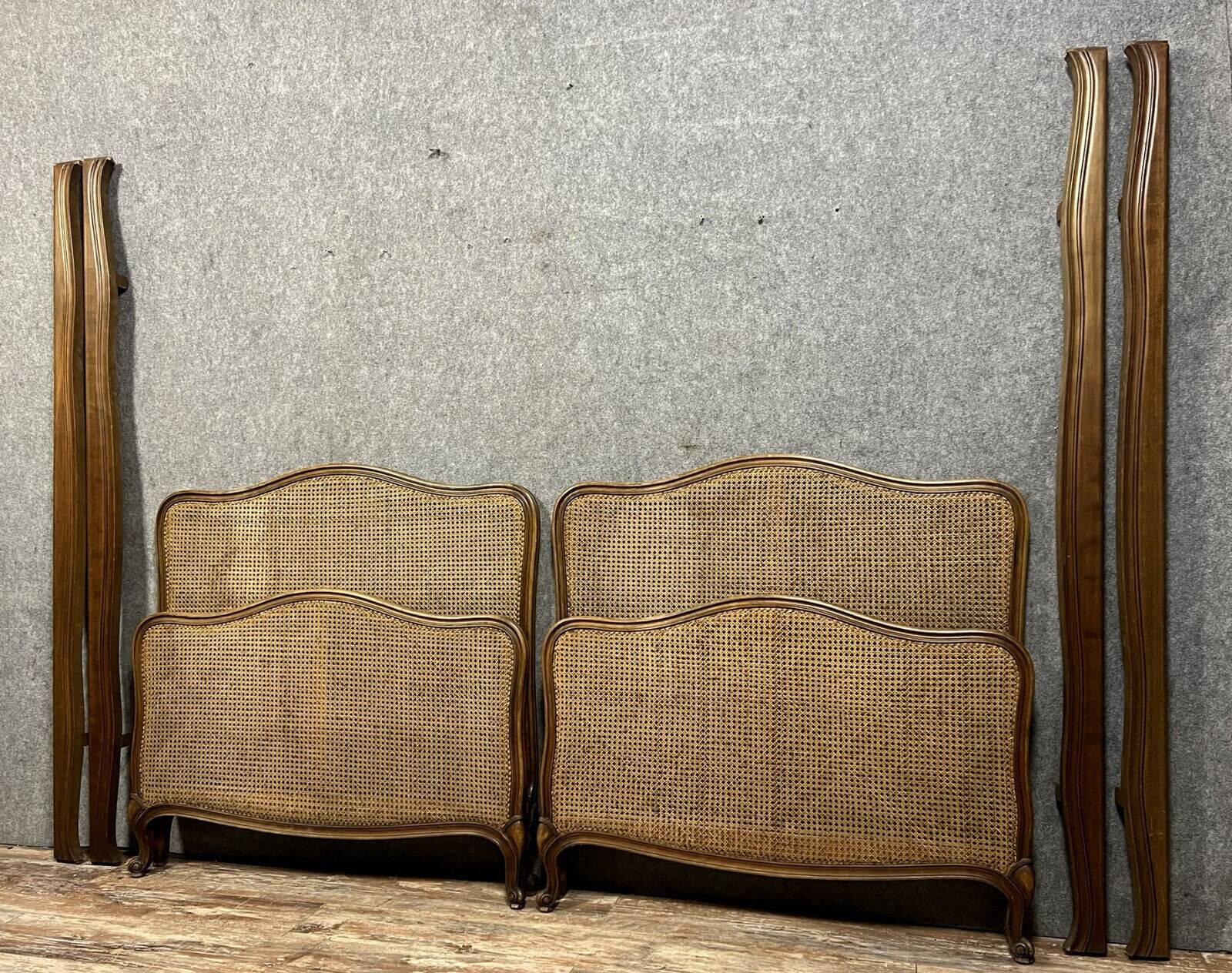 Pair of Louis XV style center beds in walnut and cane base circa 1900
