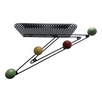 Wall coat rack in the style of Mathieu Mategot.