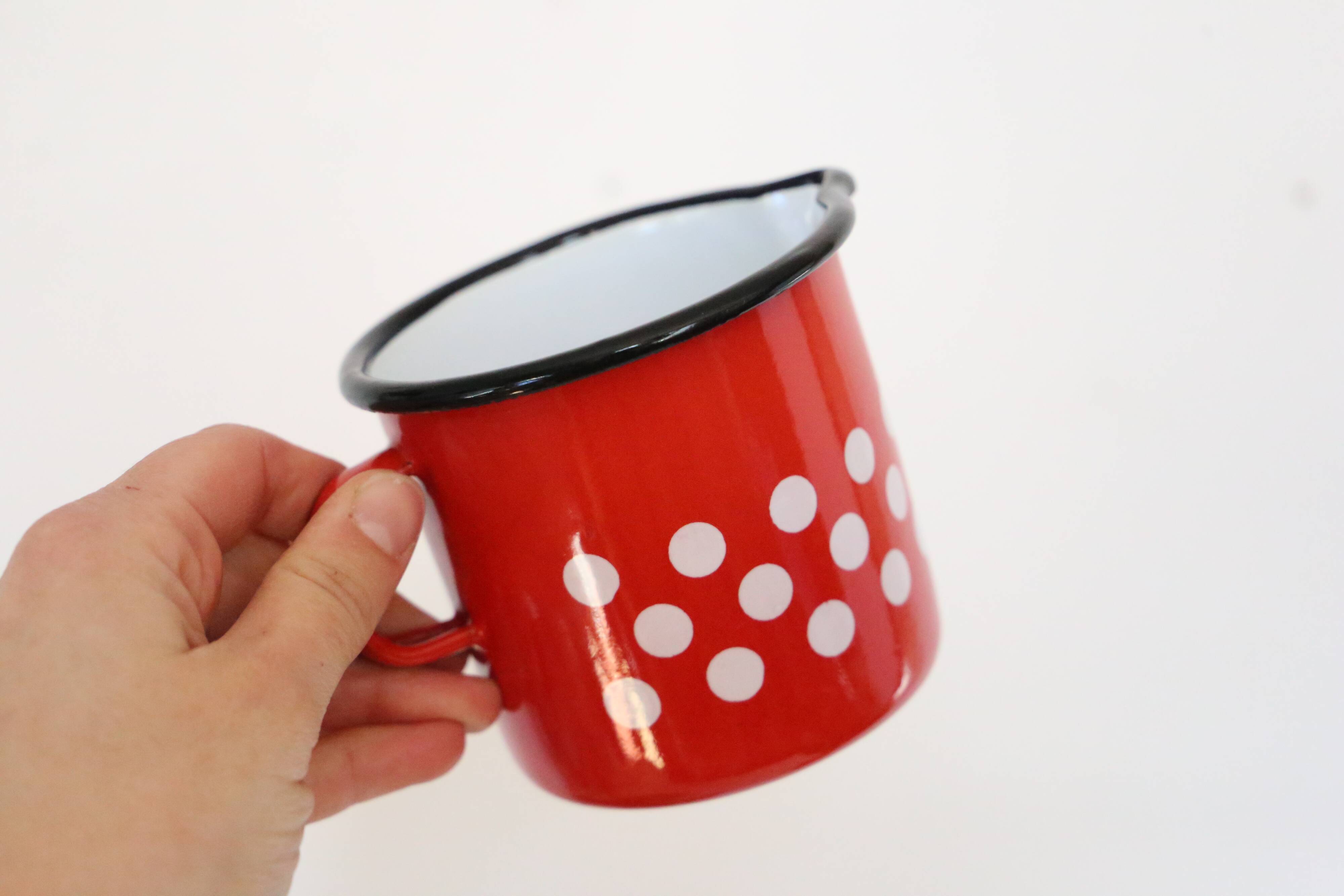 Red enamelled metal milk pot