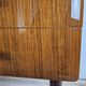 Mid-century drawer chest in mahogany, brass and glass.