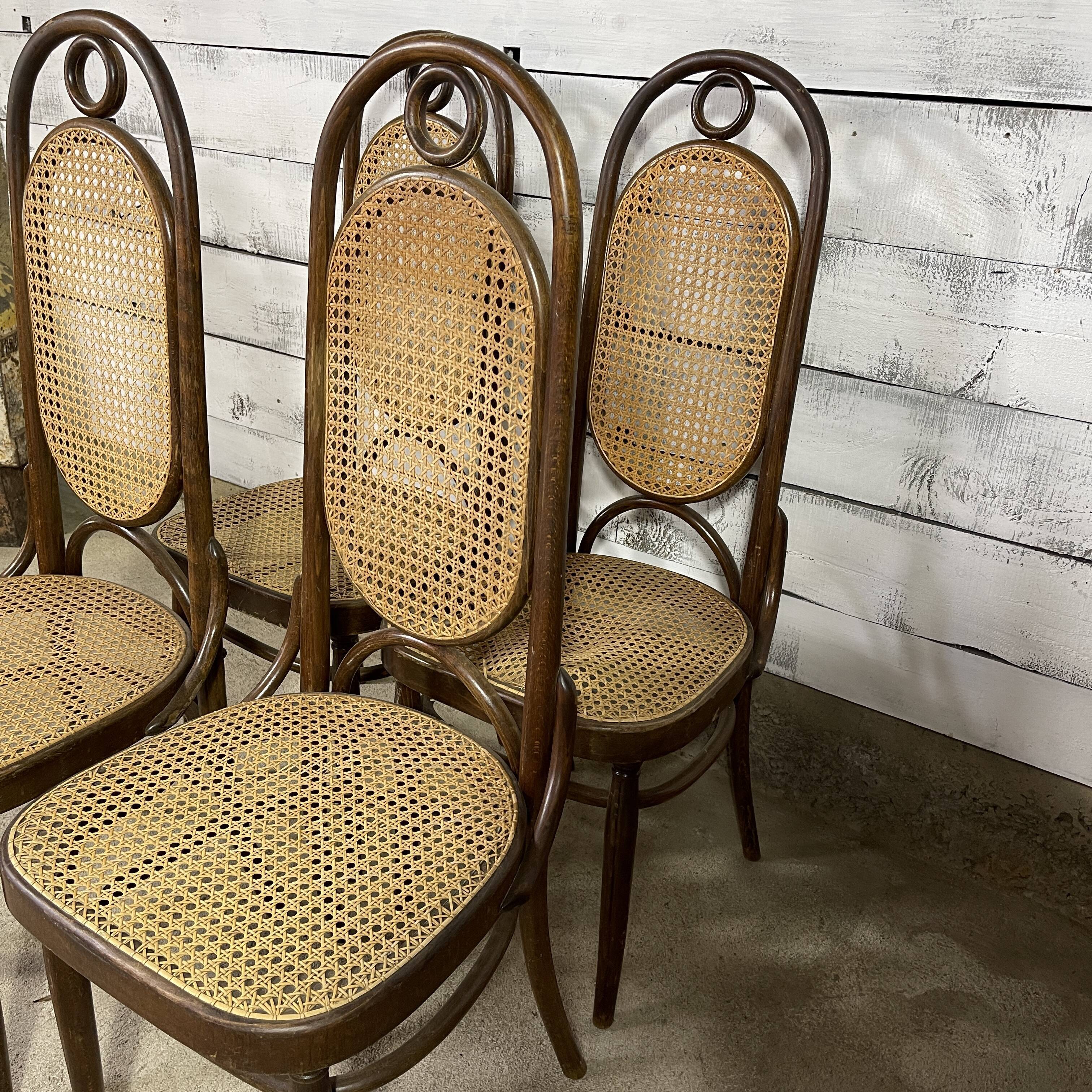 Series of 4 canned bistro chairs