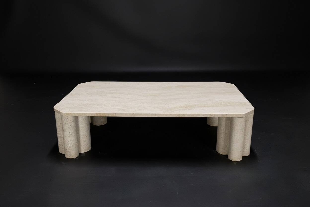Travertine coffee table by the Italian publisher Up&Up.