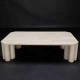 Travertine coffee table by the Italian publisher Up&Up.