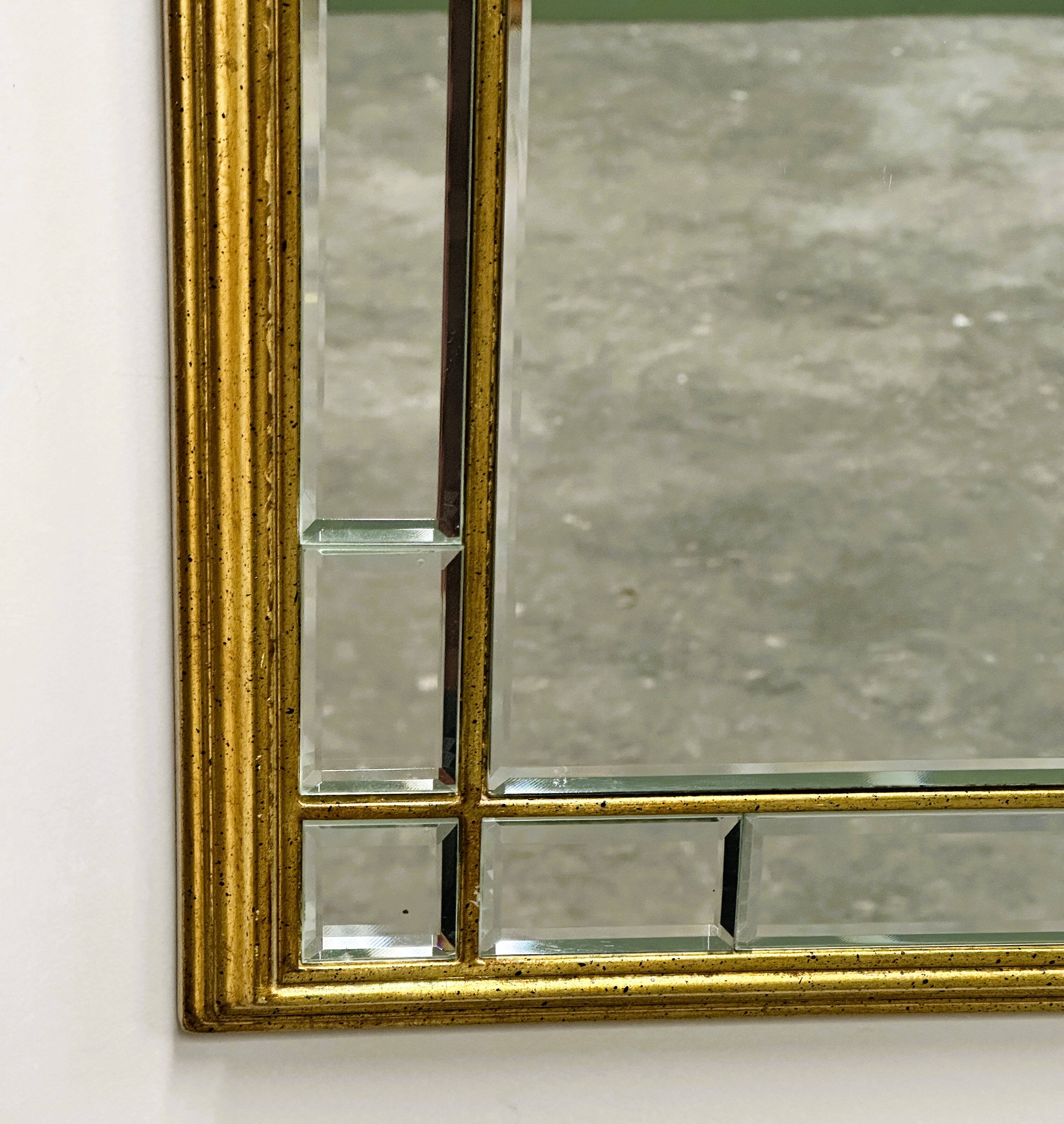 Vintage Large facet cut luxury mirror with gilded frame by Deknudt, 1980s.