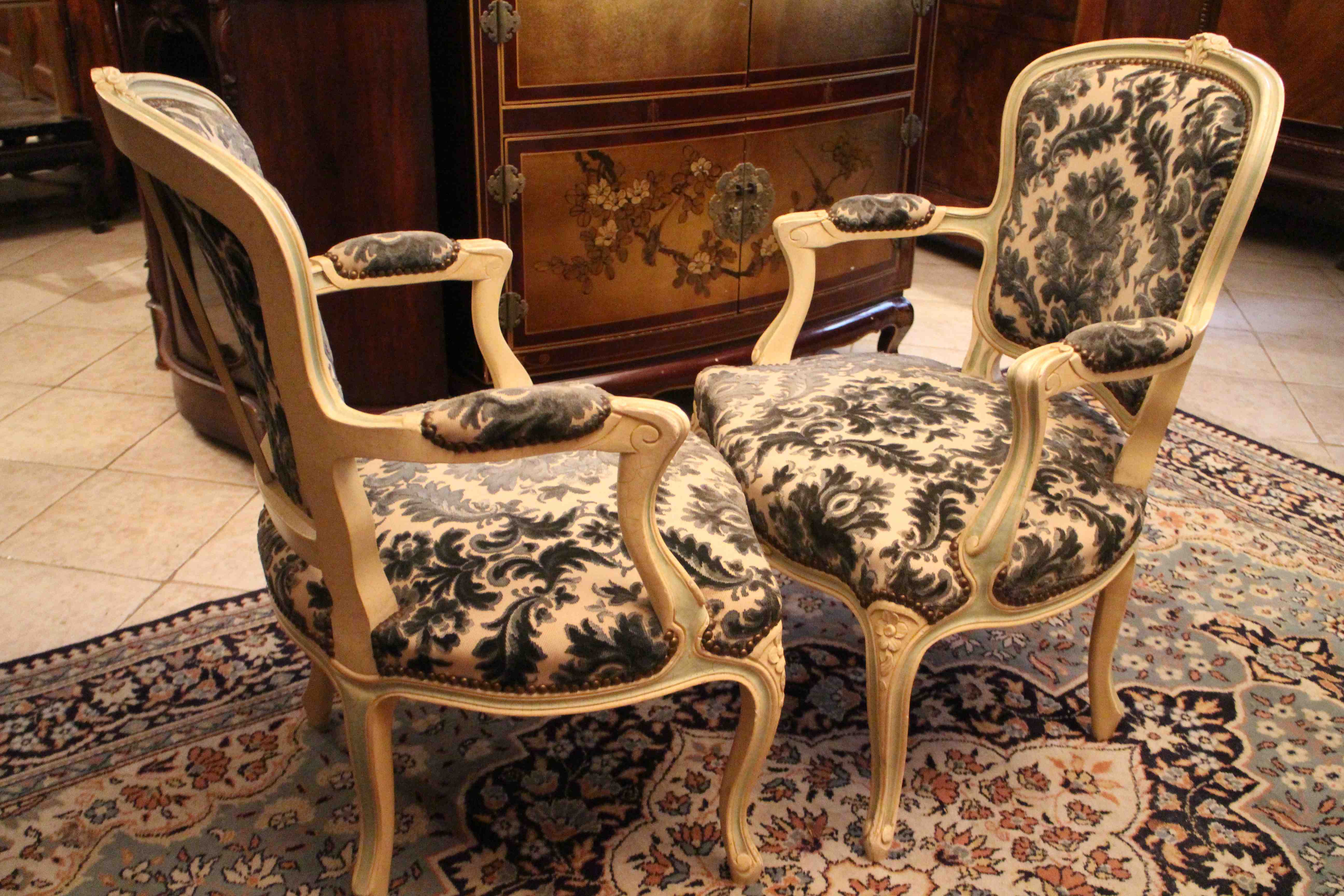Pair of Louis XV-style convertible armchairs
