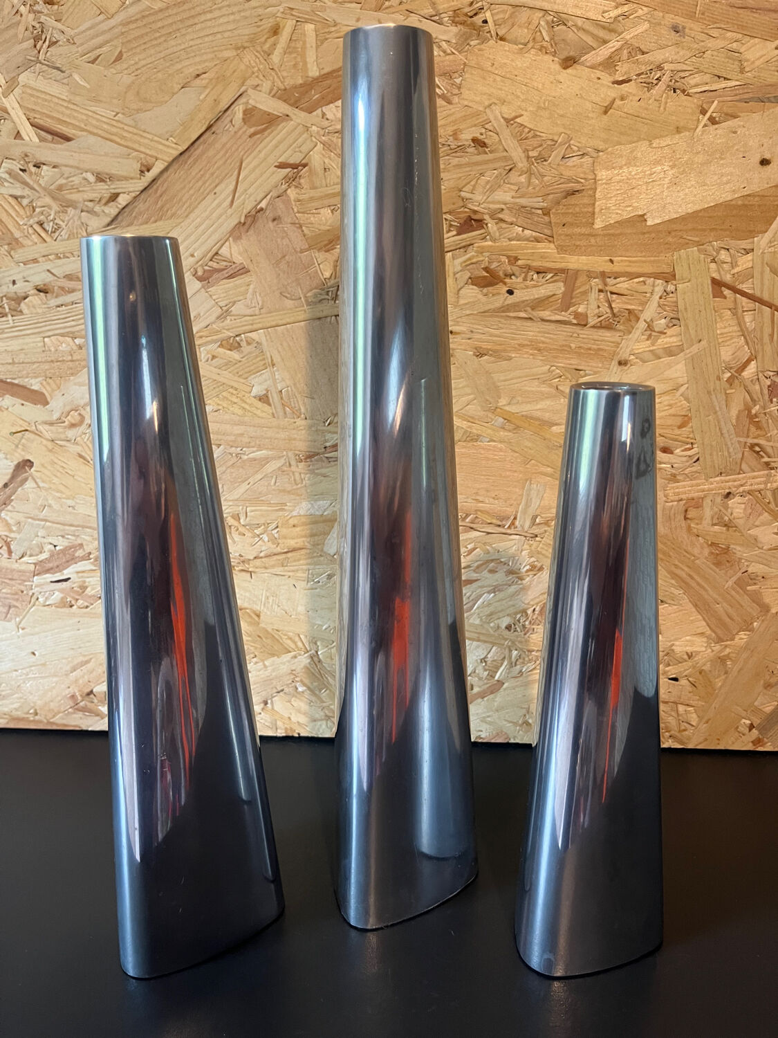 Trio of aluminum candle holders year 90