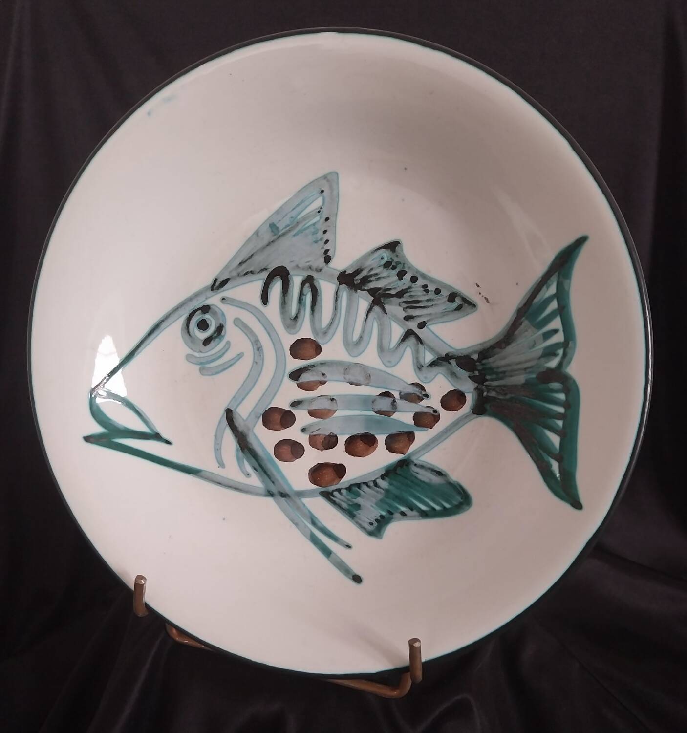 Assiette creuse à décor de poisson R.Picault