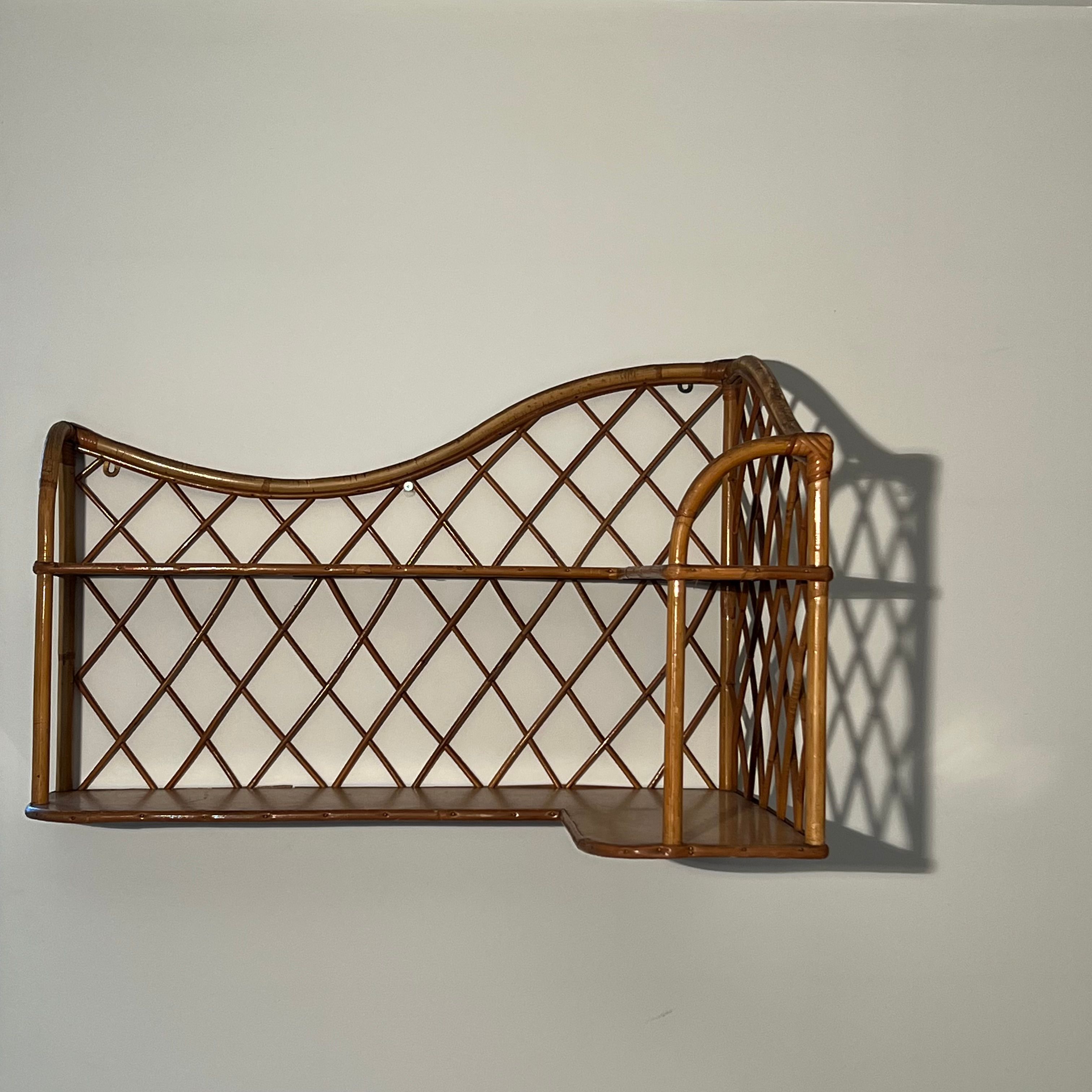 Corner wall shelf in rattan attributed to Audoux-Minet.