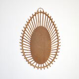 Free-form sun mirror in 60s rattan