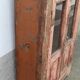 Armoire en bois rose avec portes vitrées