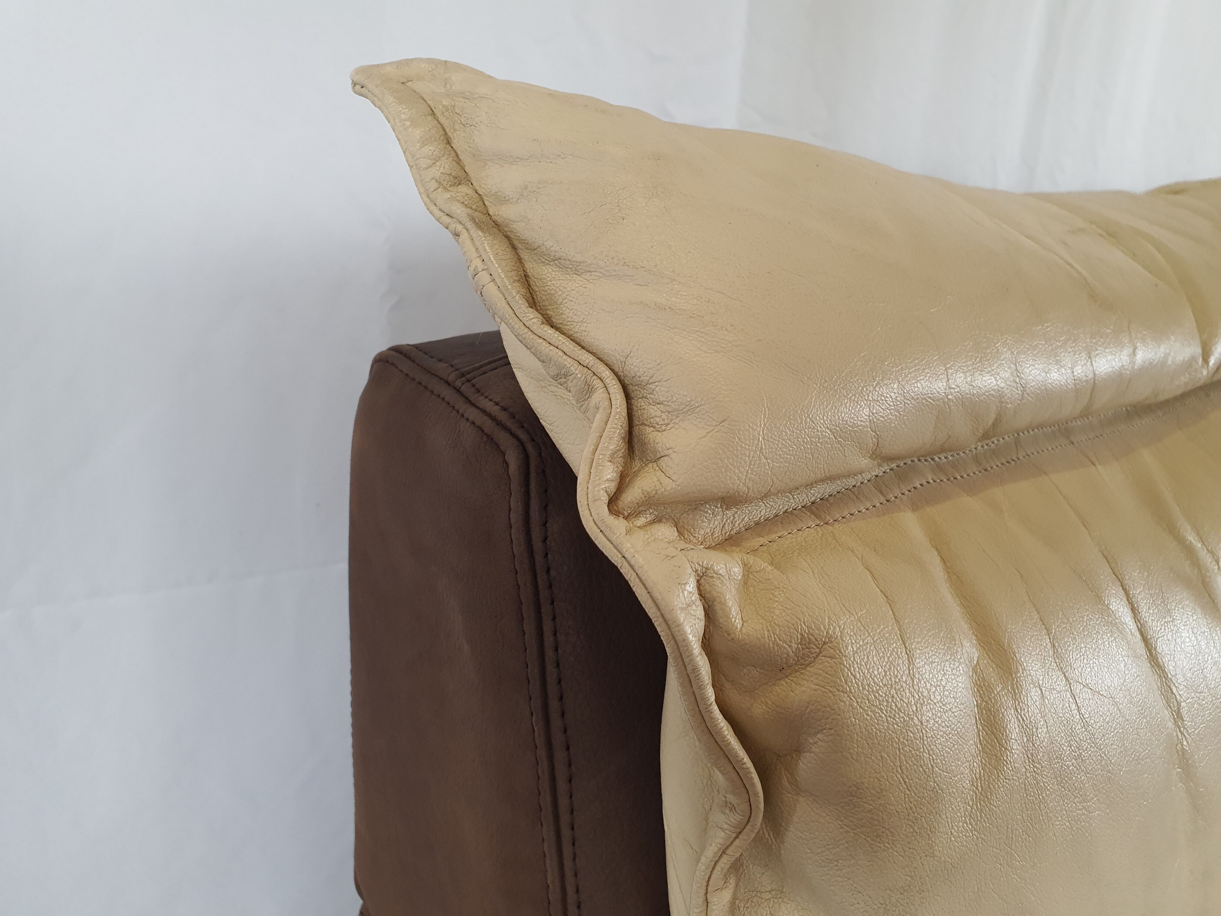 Modular sofa in leather and suede