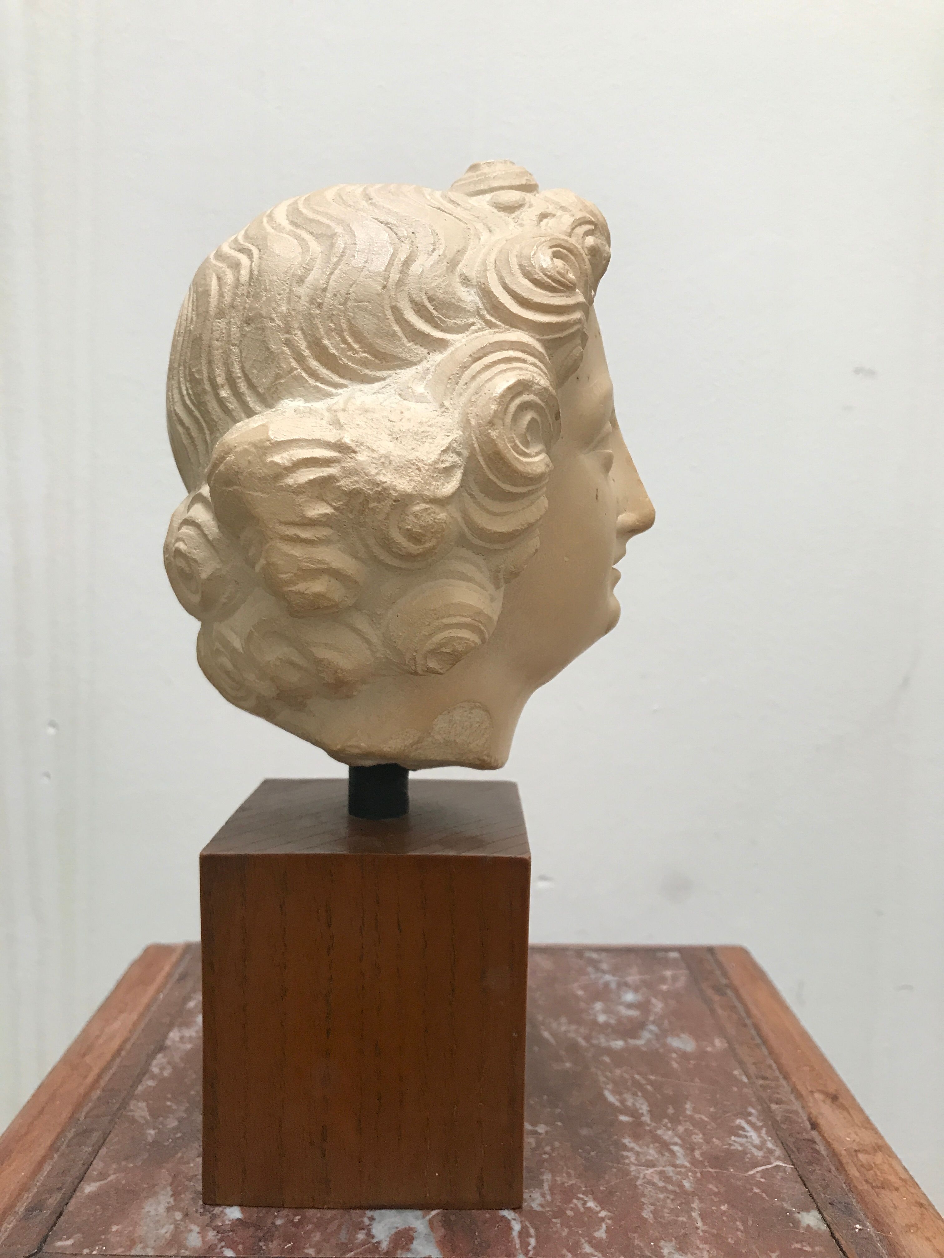 Bust angel head Louvre Museum