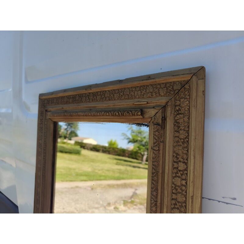 Wood and gilded stucco mirror, 19th century