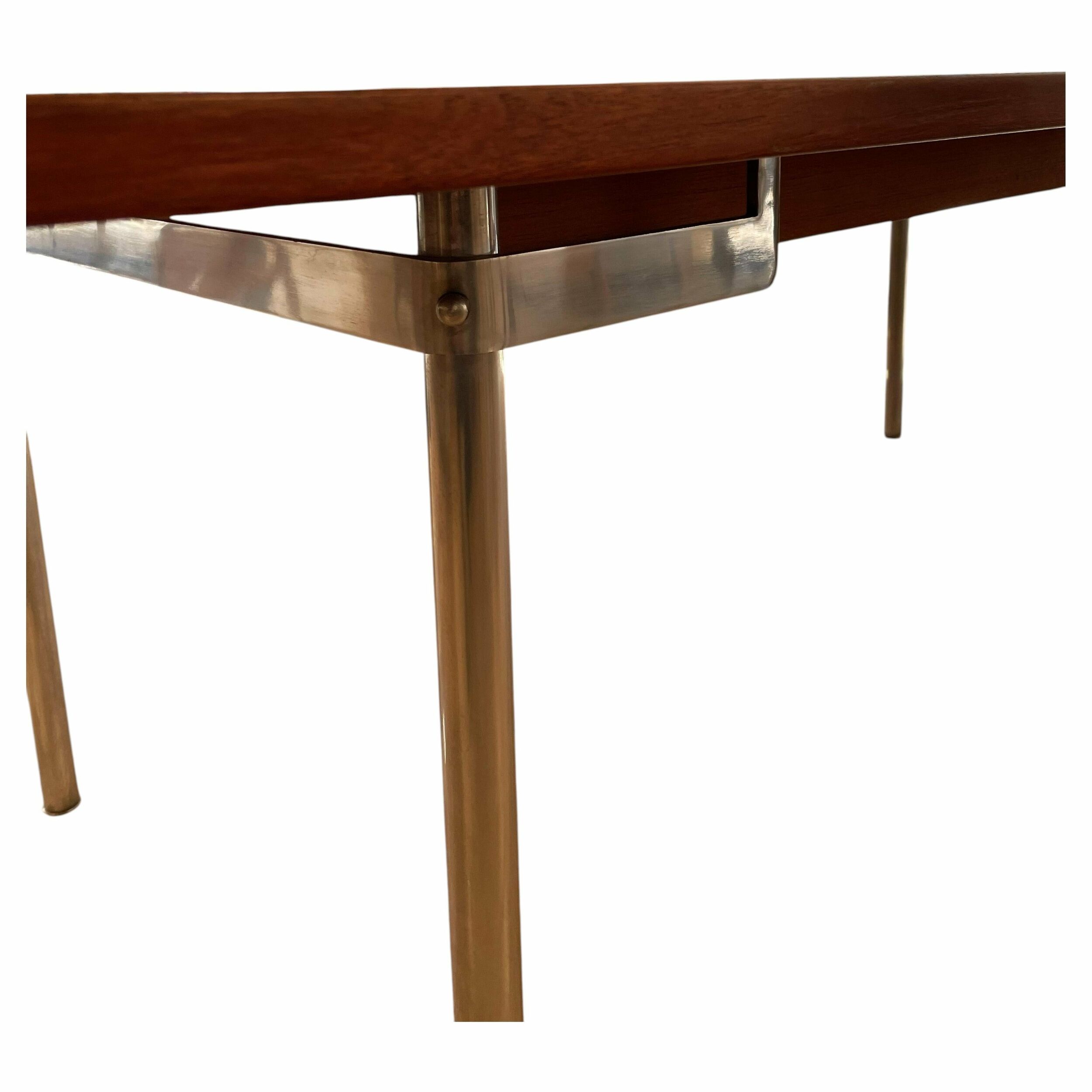 Table model AT-318 in teak and steel by Hans J. Wegner.