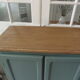 Vintage shoe cabinet smoked green wax finish, wooden top.