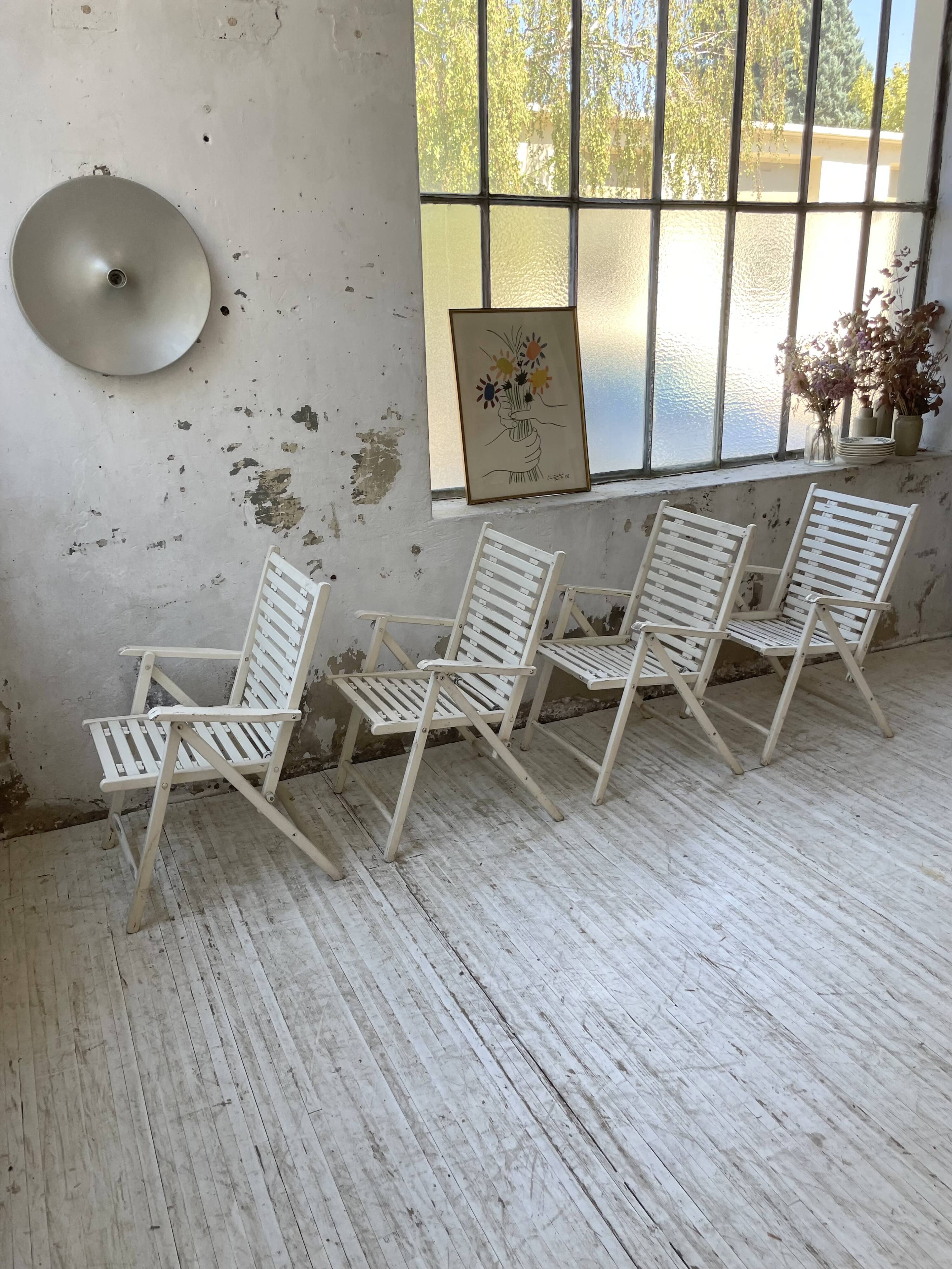 4 white wooden garden chairs