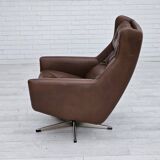 Années 1970, chaise pivotante danoise avec repose-pieds, bon état d'origine, cuir.