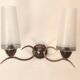 Two-light wall sconce in gilded metal with opaque glass shades, 1950/1960