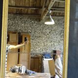 Gilded stucco mirror with gold leaf, H 152 cm