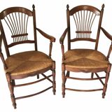 Pair of straw and cherry armchairs