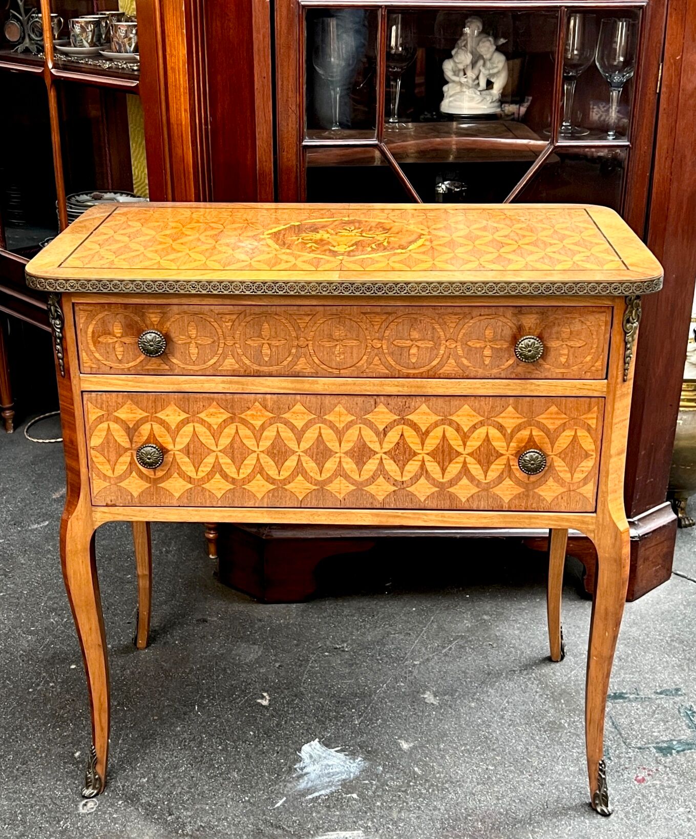 Louis XVI style chest of drawers with marquetry inlay