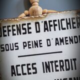 Enamelled plate defense display