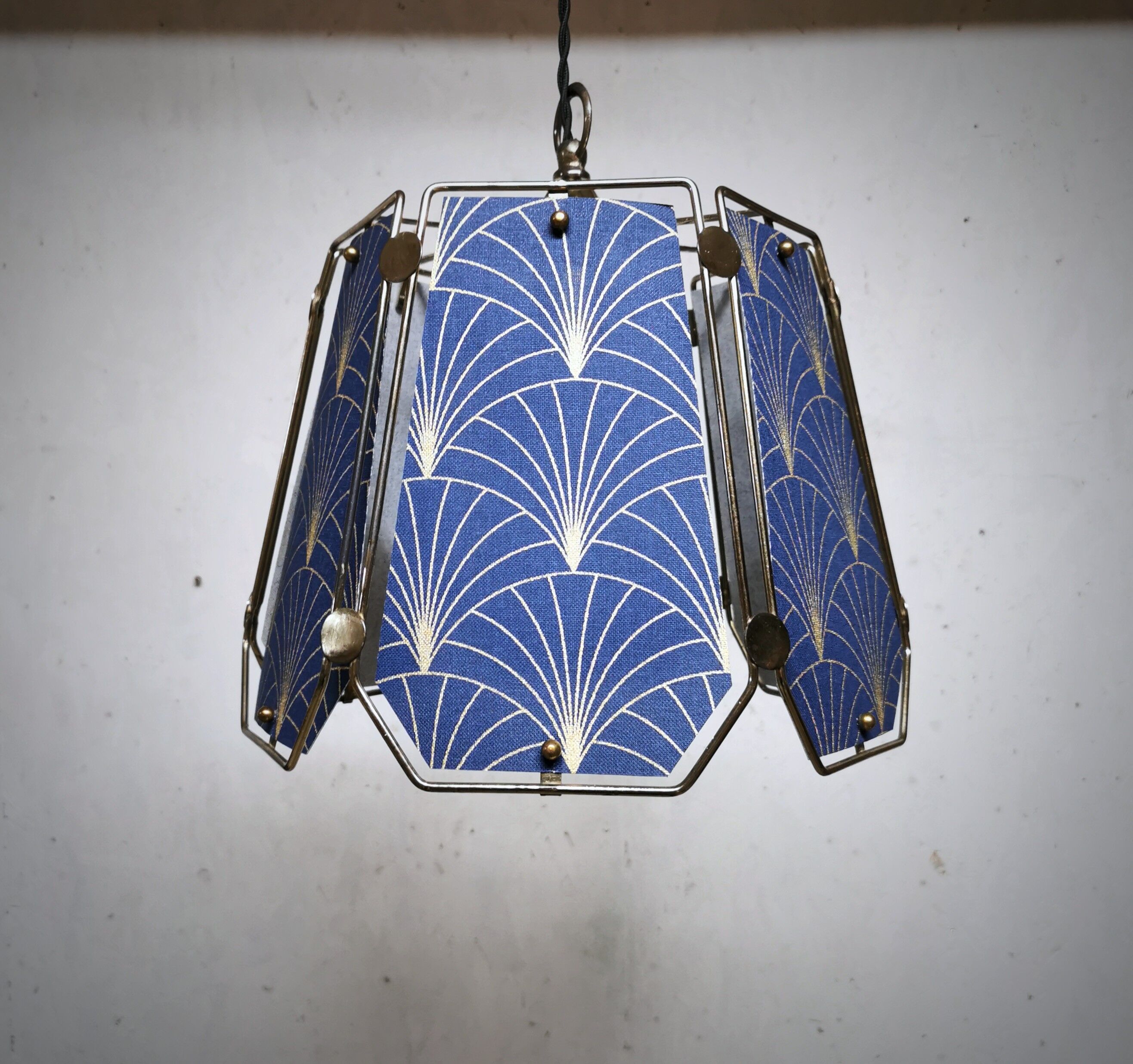 Table lamp, old turned wooden foot, metal lampshade and art deco print