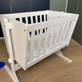 White wooden cradle
