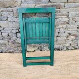 Set of 4 green folding chairs