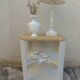 Vintage side table reimagined in beige, wooden tops.