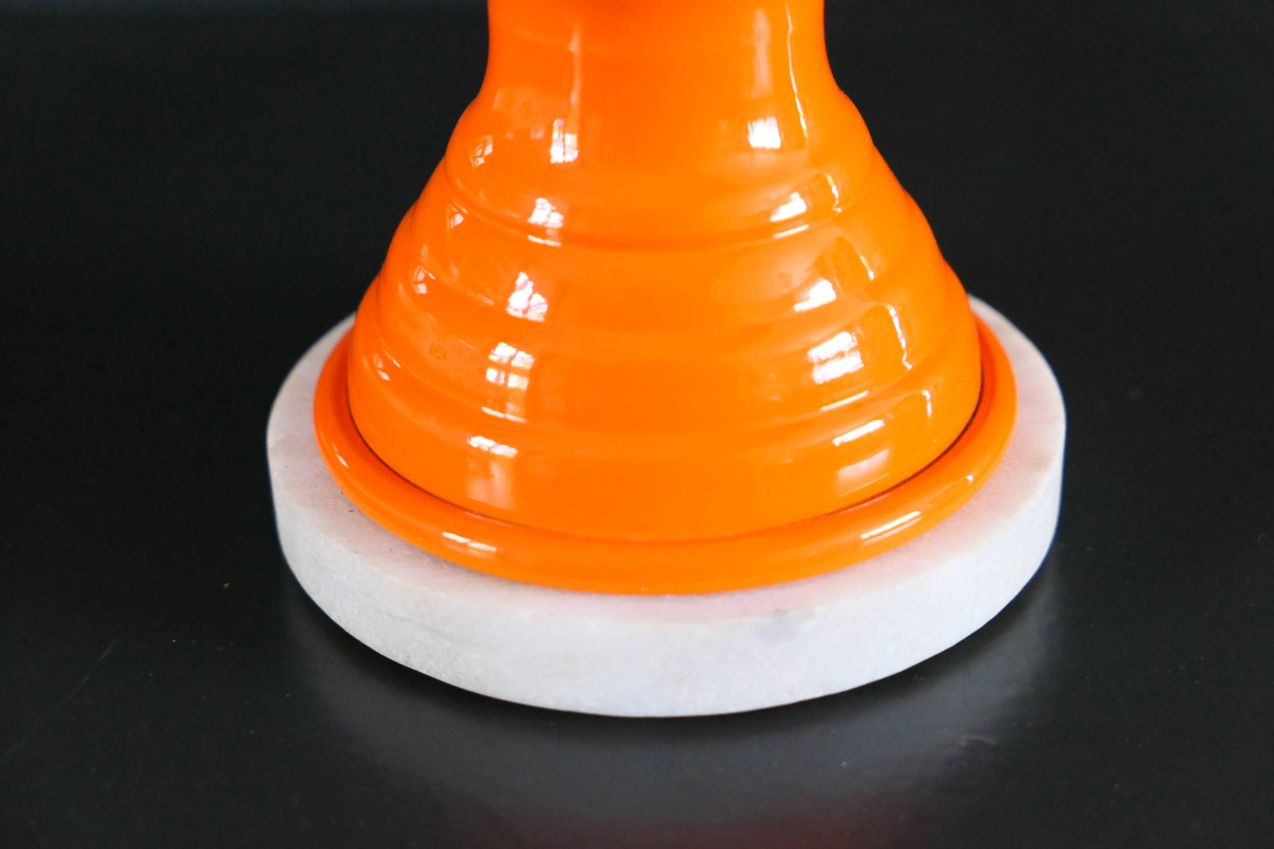 Table lamp or bedside lamp from the 1960s-70s in orange and chrome.