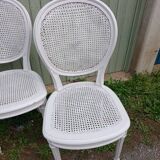 4 old wooden and cane chairs